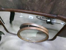 An oak bevel edged overmantel mirror and a gilt framed mirror