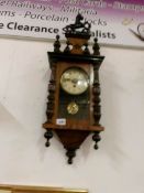 A Victorian mahogany wall clock