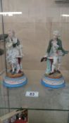 A pair of Victorian bisque figurines marked AM