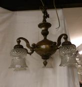 An Edwardian brass 5 arm ceiling light with cut glass shades