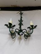 A green painted French Tole' style ceiling light