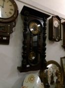 A Victorian wall clock with figure of 8 door