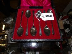 A cased set of silver tea spoons