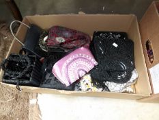 A box of evening bags etc