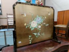 An Oriental lacquered screen