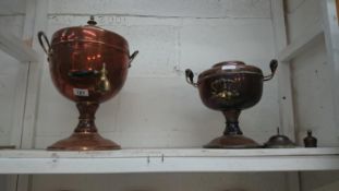 A large and a small copper samovar