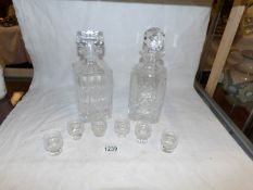 2 cut glass decanters and 6 glasses