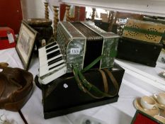 A cased Francesco Modello accordian