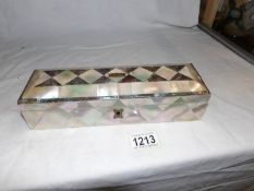 A mother of pearl and abalone glove box