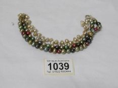 A multicoloured cultured pearl bracelet