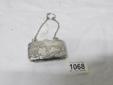 An embossed silver purse, Birmingham 1902/03,