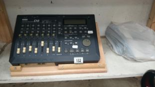 A Korg D8 digital recording studio with all leads and instruction book,
