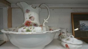 A Royal Doulton 'Poppies' jug and basin set