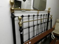 A 5ft brass and iron bedstead