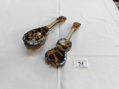A 'Tortoise shell' mandolin and a 'Tortoise shell' guitar