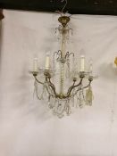 A 1940's glass chandelier with fancy droppers