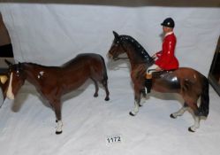 A Beswick horse with mounted huntsman a/f and another Beswick horse