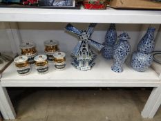 A set of ceramic storage jars and a quantity of blue and white china