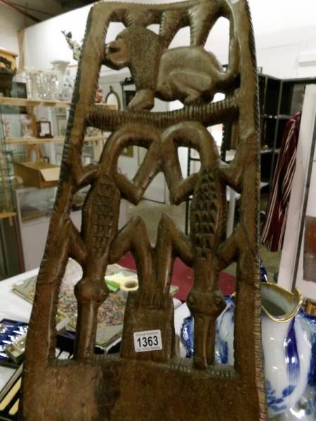 An East African carved hardwood birthing chair from the Congo. - Image 2 of 2
