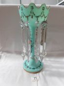 A Victorian Turquoise glass lustre with hand enamelling,