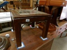 A glass topped coffee table