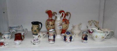 A mixed lot of jugs including Victorian Toby jugs