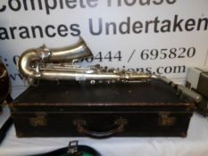 A silver plated Buescher saxaphone in case