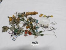A mixed lot of costume jewellery including some silver items