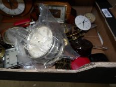 A box of clocks and clock parts