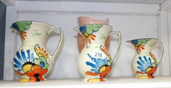 A set of 3 graduated Beswick jugs (1 a/f on foot) and a Sylvac Deco vase