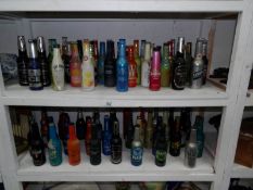 An assorted collection of in excess of 70 alcopops etc,