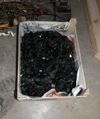 A box of black glass chandelier buttons