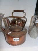 A Victorian copper kettle and one other
