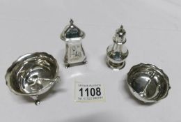 2 silver salts with spoons and 2 silver pepperettes