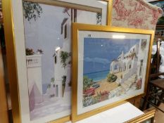 A pair of framed and glazed prints