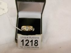 An 18 ct gold ring set diamonds,