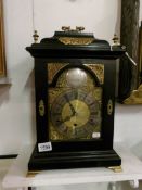 A Skiba Oundle brass faced bracket clock