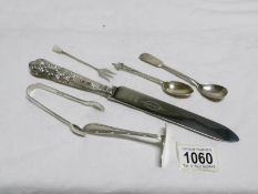 A silver handled cake knife and other silver items