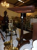 A side table of good rosewood, William IV tripod base on bun feet,