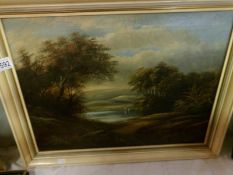 An oil on canvas country scene signed F Barten