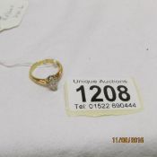 An 18ct gold ring set diamond,