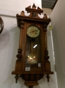 A mahogany wall clock