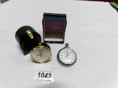 A Smith's pocket watch together with a Jaegar travel clock