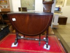 A small mahogany drop leaf table