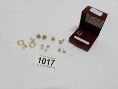 5 pairs of gold earrings