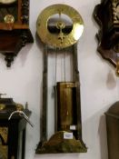 An early 20th century brass waterclock by A E Veal,