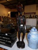 A large carved wood African figure