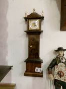 A miniature Grandfather clock