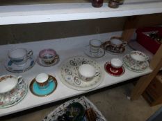 A mixed lot of cups and saucers including Wedgwood,