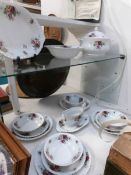 16 pieces of continental rose decorated dinnerware
